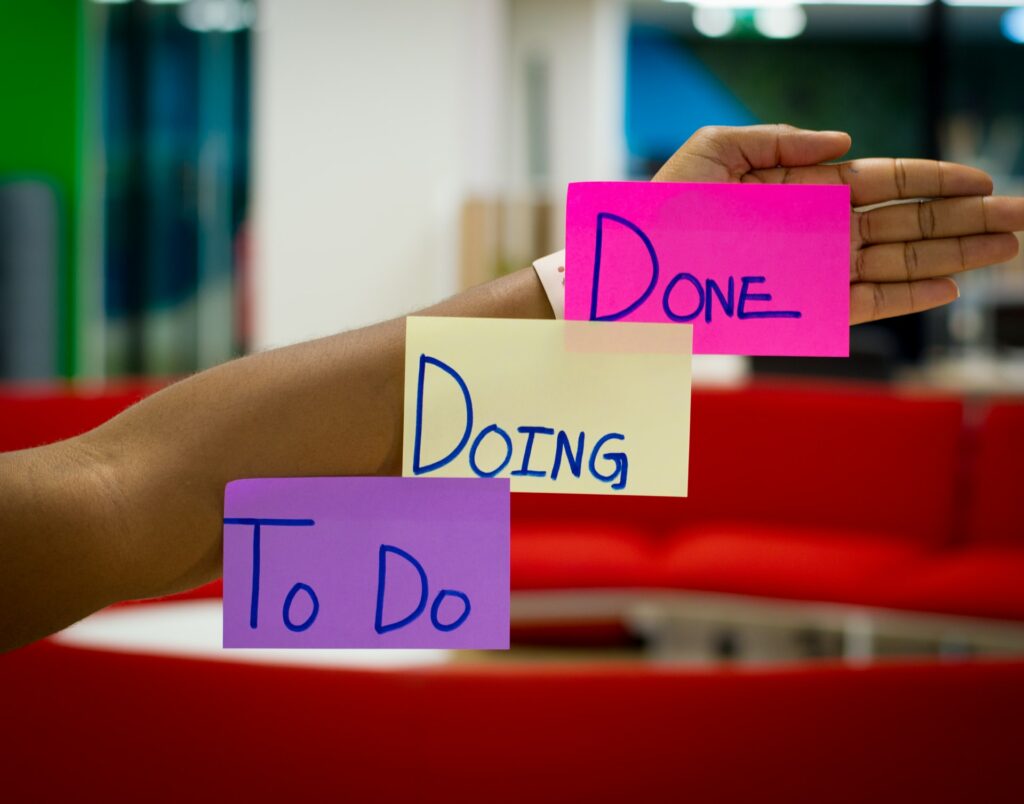 Three post its on a hand