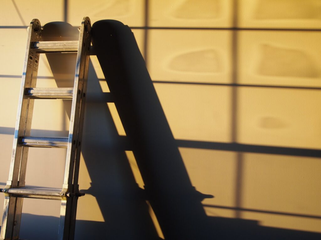 Ladder leaning on wall